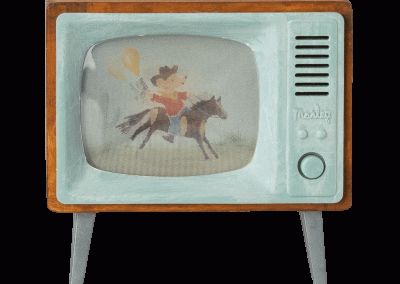 image of mouse house sized television showing rocking horse mouse