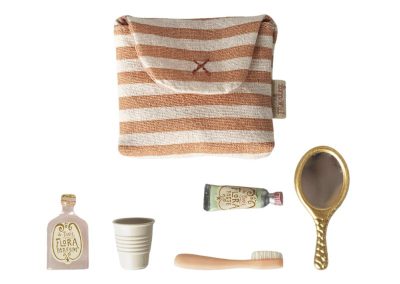 toothbrush set with coral striped bag