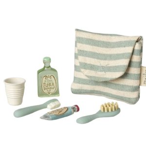 blue striped bag and toothbrush set