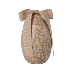 a powder coloured metal easter egg printed with animal print with a large bow on top