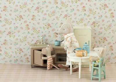 bedroom scene with triplet baby mouse in mint highchair