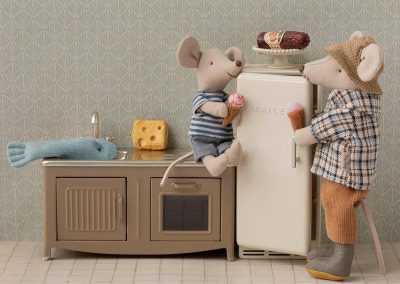 kitchen scene with grandad and little brother mouse and kitchen counter with fish