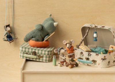 play scene with hiker mouse in life jacket and big brother, rubber boat, suitcases and hippo